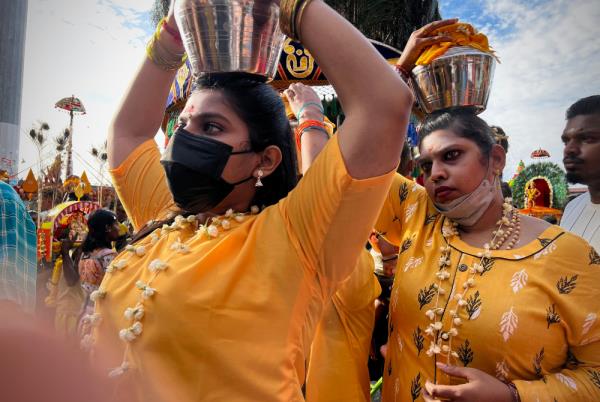 Hindu devotees carrying offerings of milk pots at the temple - Pic by Sinar Daily reporter Hajar Umira